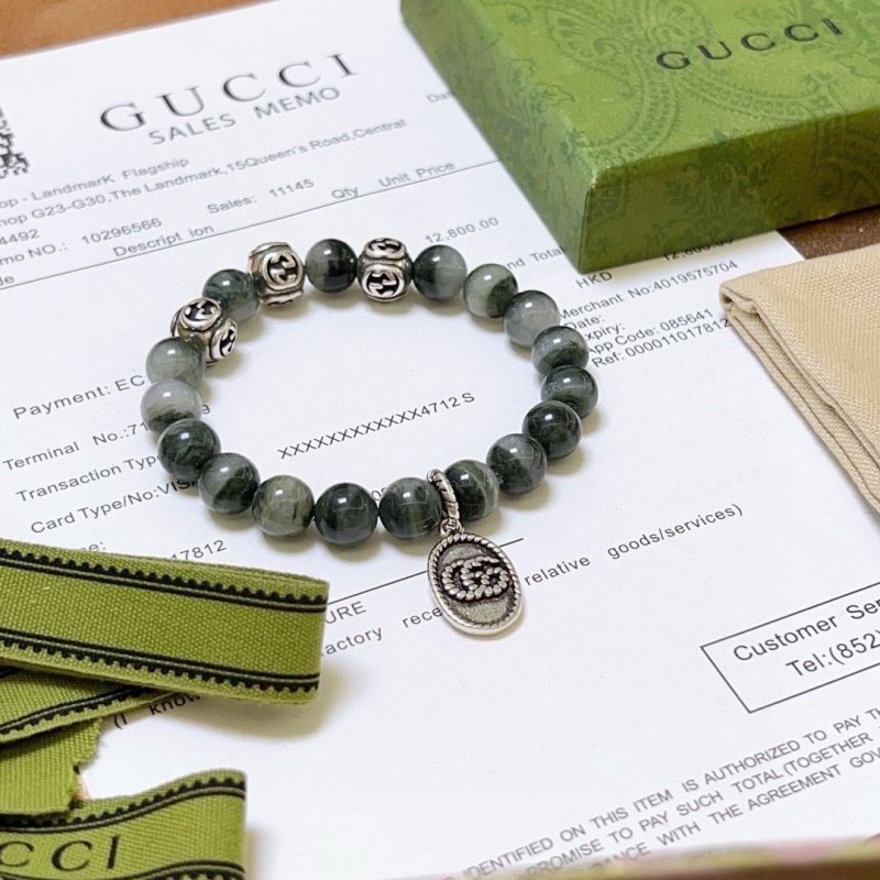 G*u*i bracelets